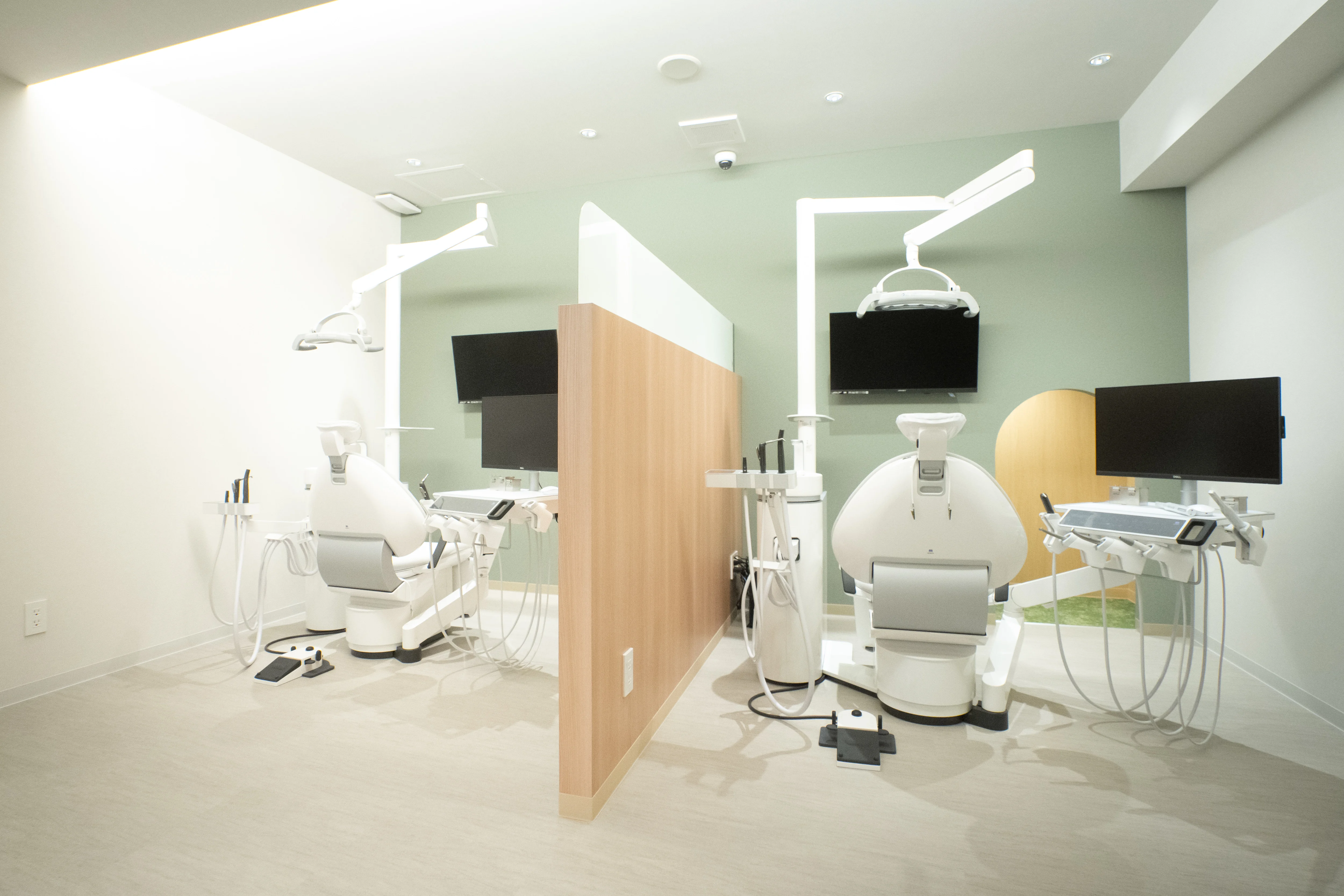 Semi-private treatment rooms with partitions